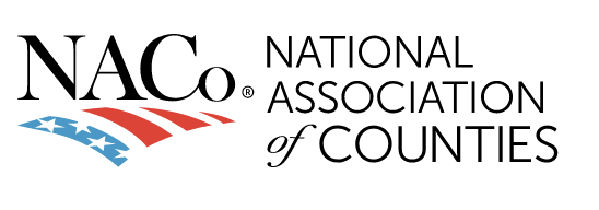 A logo with the American flag and the words "National Association of Counties"